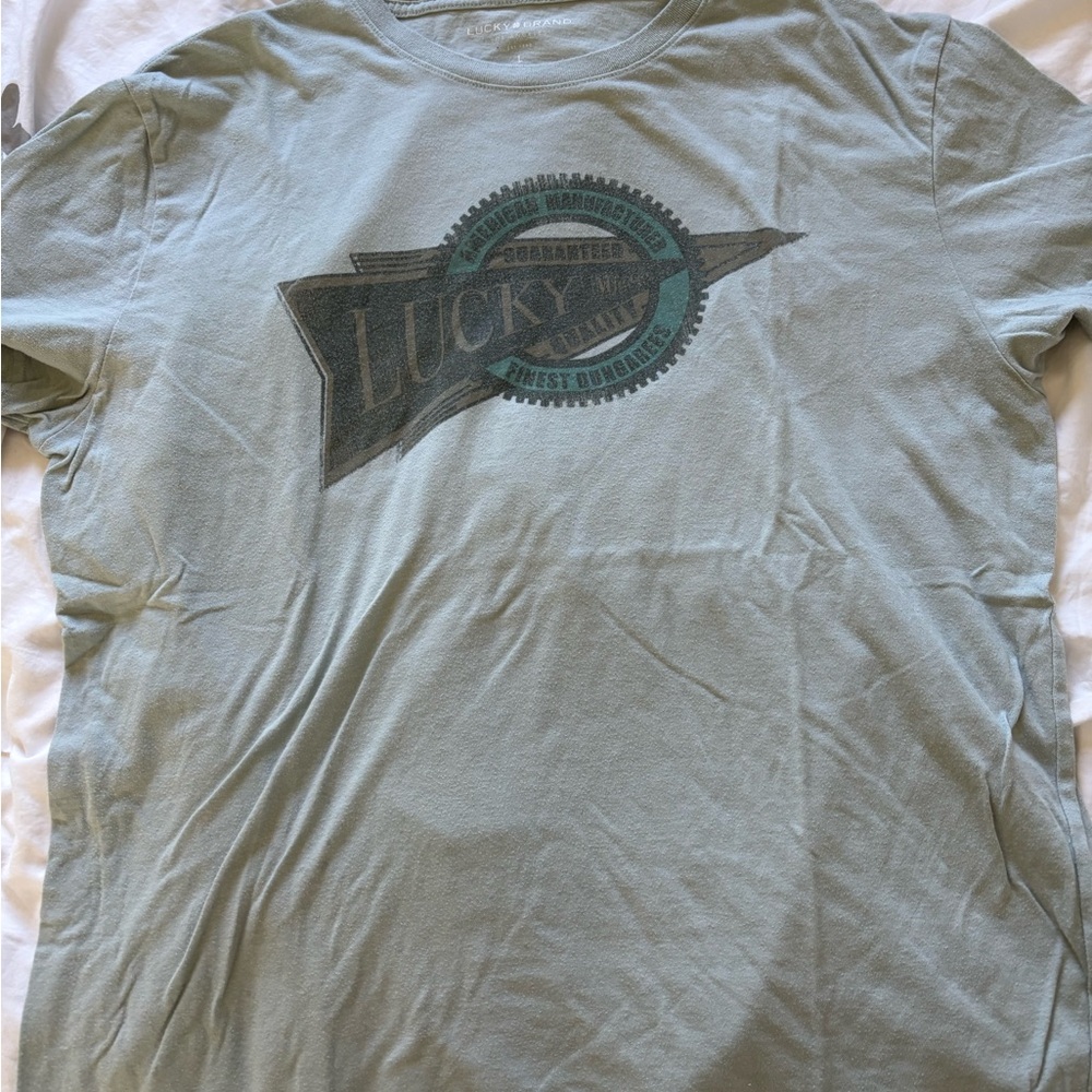 ⭐️ 4 for $20 - Bundle and save!!! ⭐️
Lucky Brand Men's Light Gray Graphic Tee - Picture 4 of 5